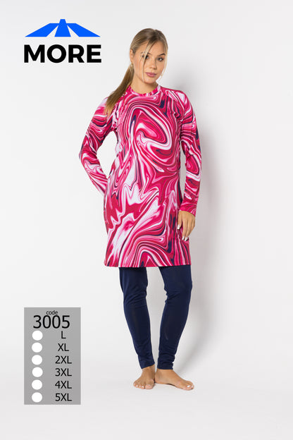 Woman wearing a pink and white marbled dress with navy leggings on a white background, featuring the brand 'MORE'.