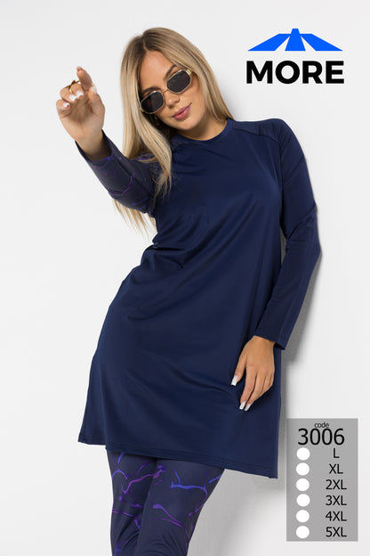 Woman wearing a navy long-sleeve top and purple leggings with sunglasses, on a white background with 'MORE' branding.