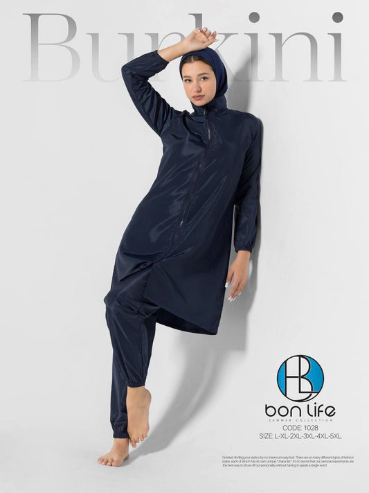لقطة كاملة للموديل ترتدي بوركيني Bon Life كحلي سادة كود 1028 بتصميم سحاب أمامي.