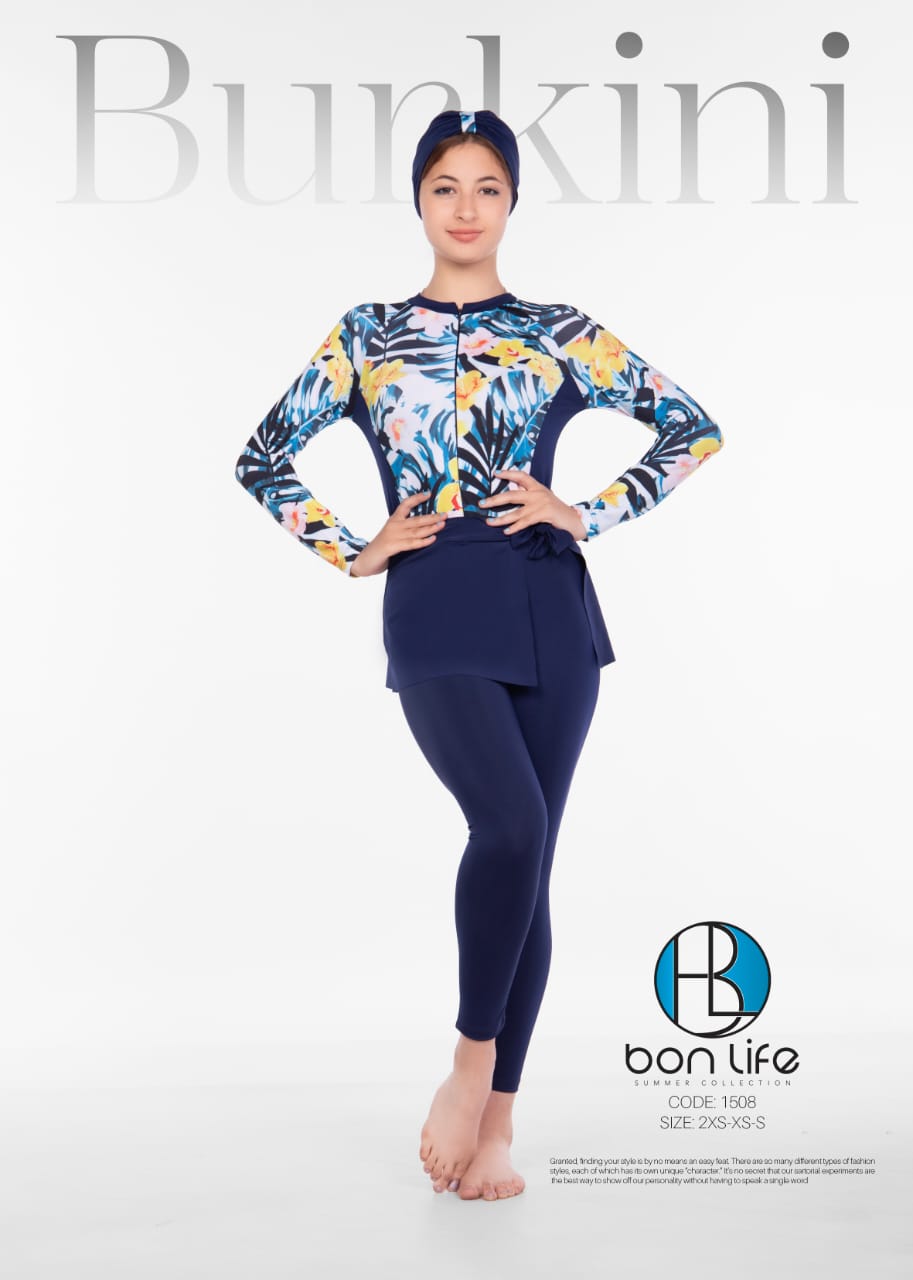 Woman wearing a colorful top and navy leggings with 'bon life' branding on a white background.