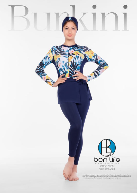 Woman wearing a colorful top and navy leggings with 'bon life' branding on a white background.