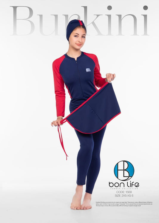 Woman holding a navy and red bunkini with 'bon life' branding on a white background