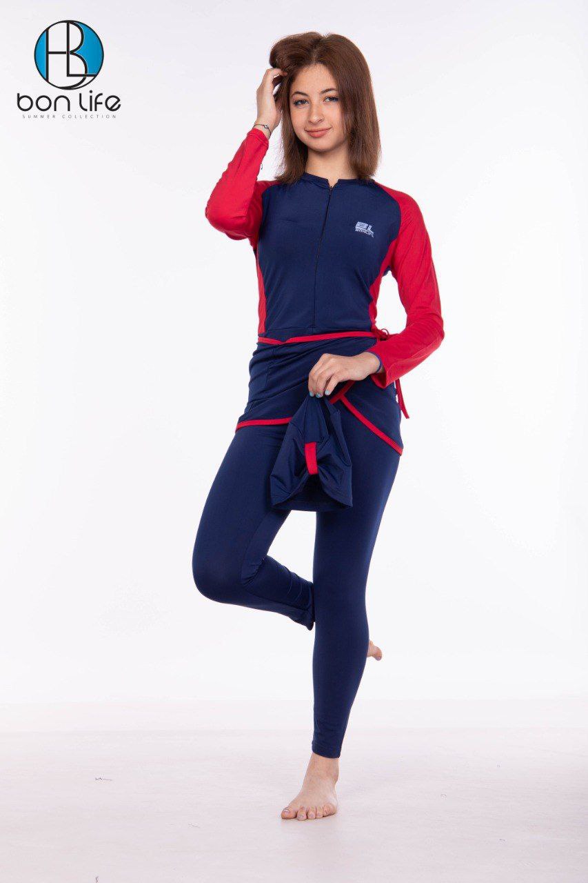 Woman wearing a navy and red outfit with 'bon life' branding on a white background